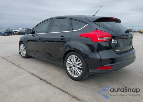 2015 Ford Focus Titanium z USA, uszkodzony, nr VIN 1FADP3N29FL347770